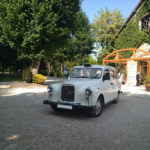 Mariage taxi anlglais blanc avec chauffeur événement voiture de mariage black cab