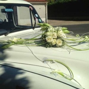 TaxiFun Taxi anglais blanc décoré par MOF meilleur ouvrier de France fleuriste location voiture de mariage avec chauffeur